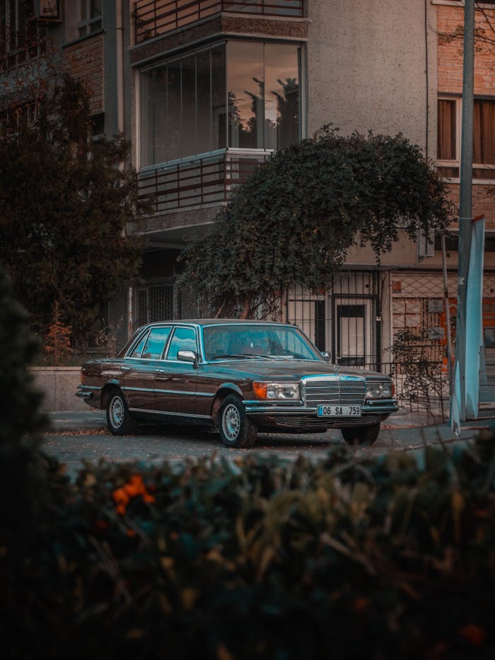 A classic vintage Mercedes Benz parked in an urban setting in Ankara, showcasing timeless elegance.